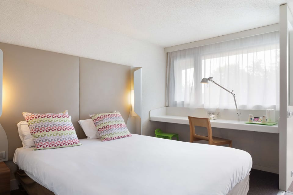 Premium bedding, laptop workspace, soundproofing, iron/ironing board