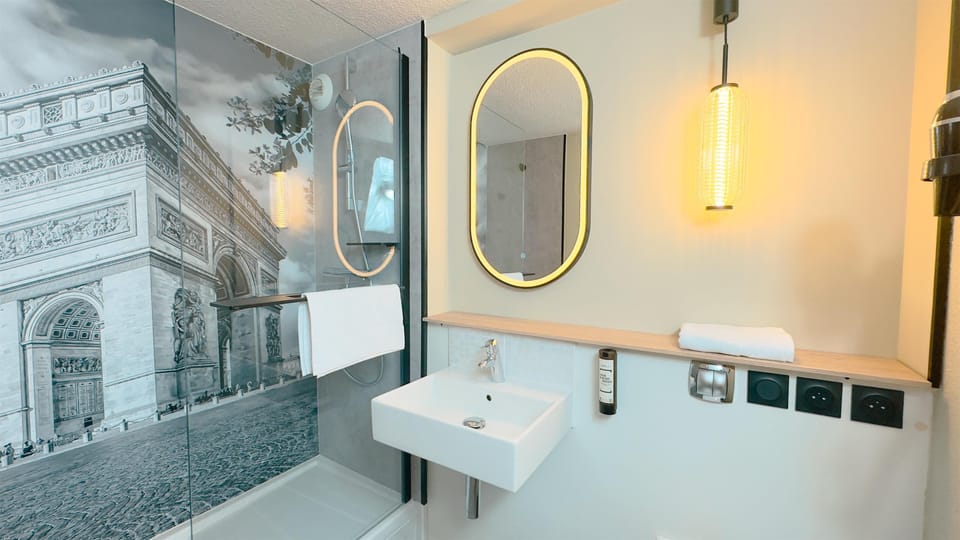 Shower, eco-friendly toiletries, hair dryer, towels