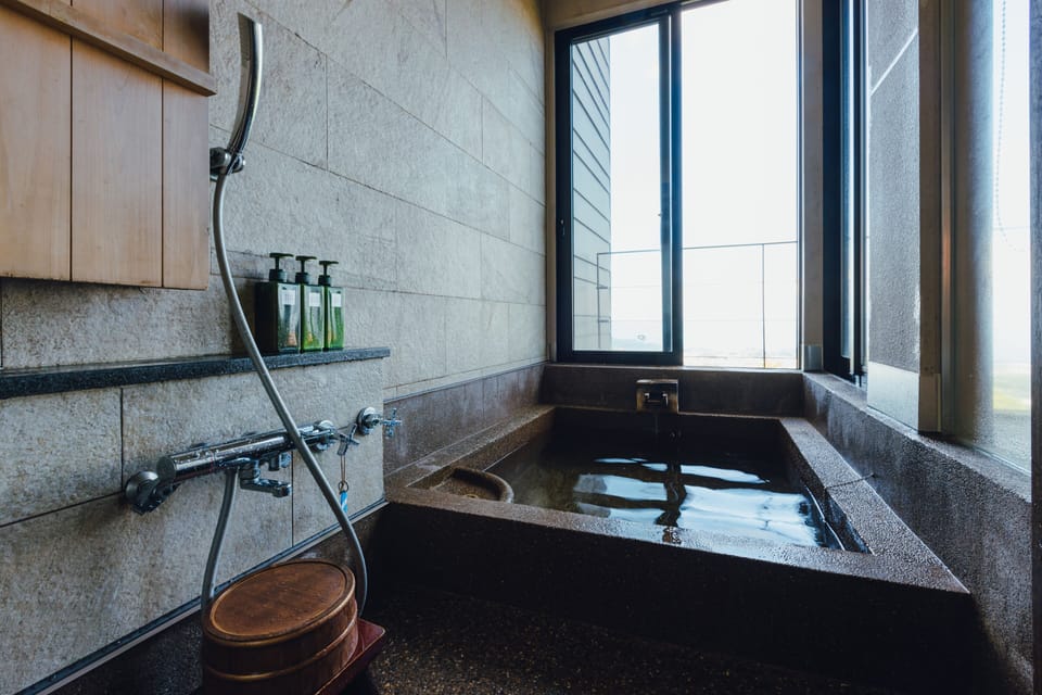 Separate tub and shower, spring water tub, free toiletries, hair dryer