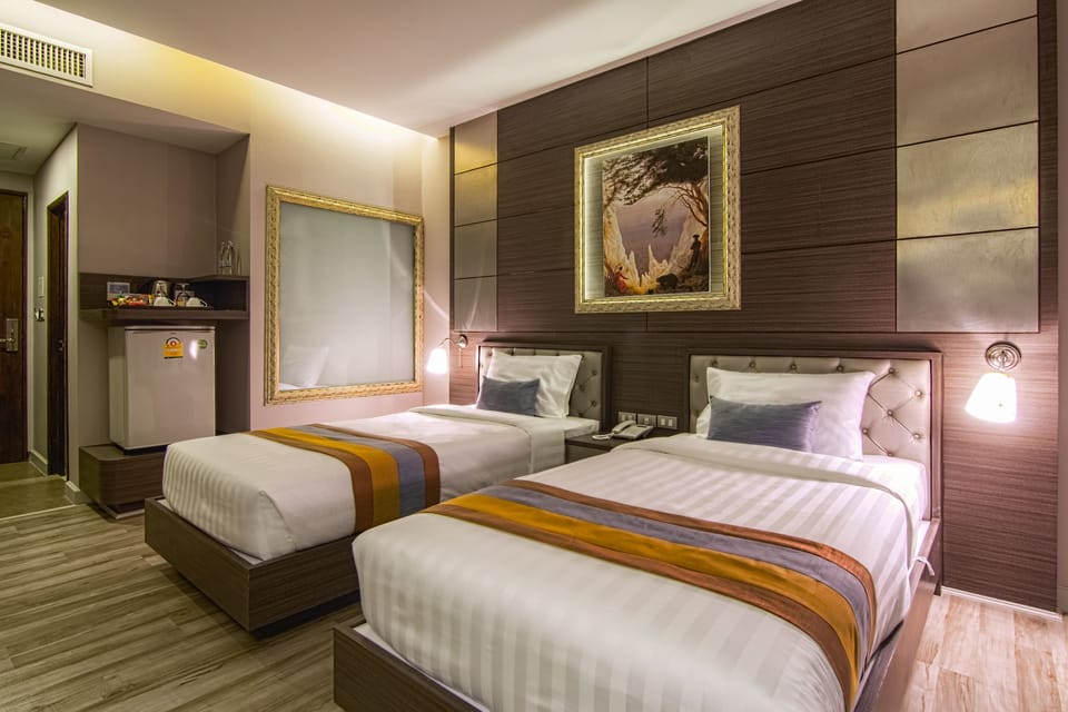 Superior Room, 2 Twin Beds, Non Smoking, Private Bathroom | Free minibar items, in-room safe, individually decorated, desk
