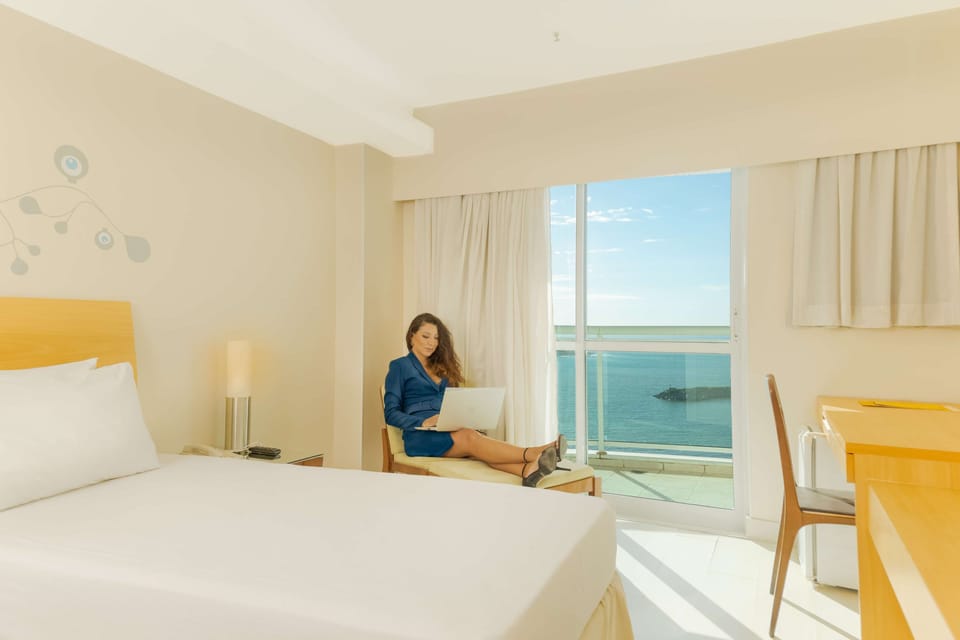 Standard Room, 2 Twin Beds, Balcony, Ocean View | Minibar, desk, blackout drapes, soundproofing