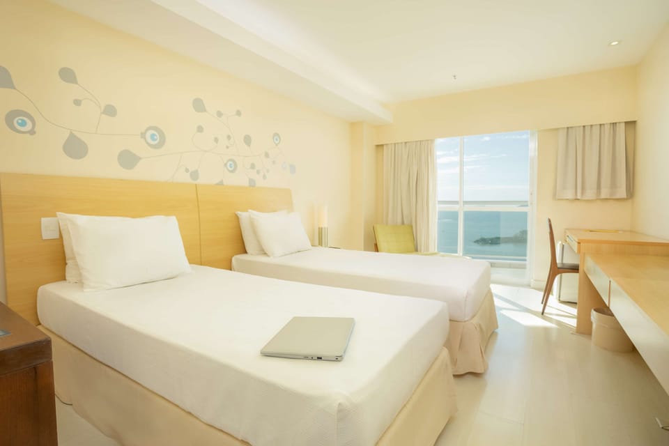 Standard Room, 2 Twin Beds, Balcony, Ocean View | Minibar, desk, blackout drapes, soundproofing