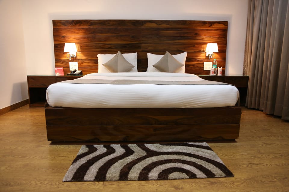 Suite, 1 King Bed, 2 Bathrooms, City View | Hypo-allergenic bedding available, minibar, in-room safe, desk