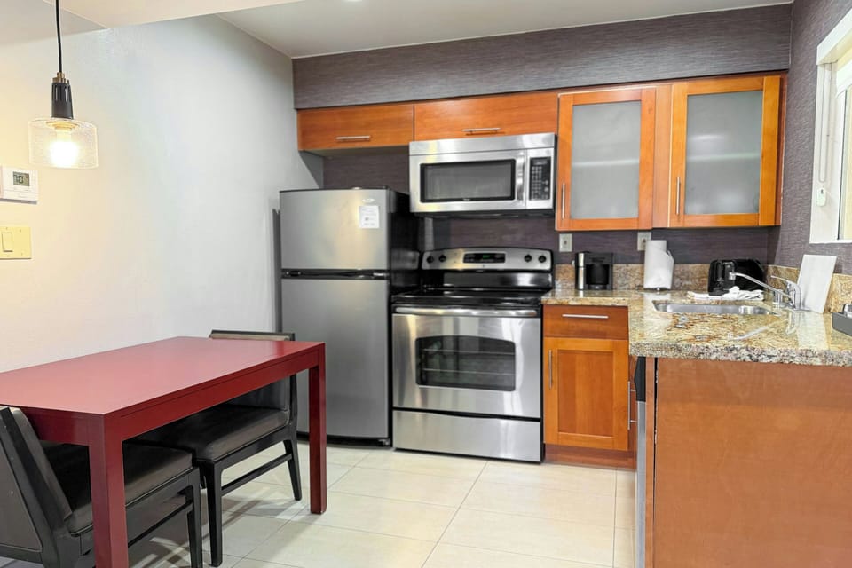 Suite, 2 Bedrooms | Premium bedding, in-room safe, desk, iron/ironing board