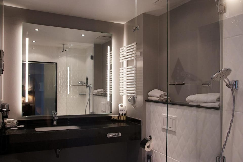 Shower, free toiletries, hair dryer, towels
