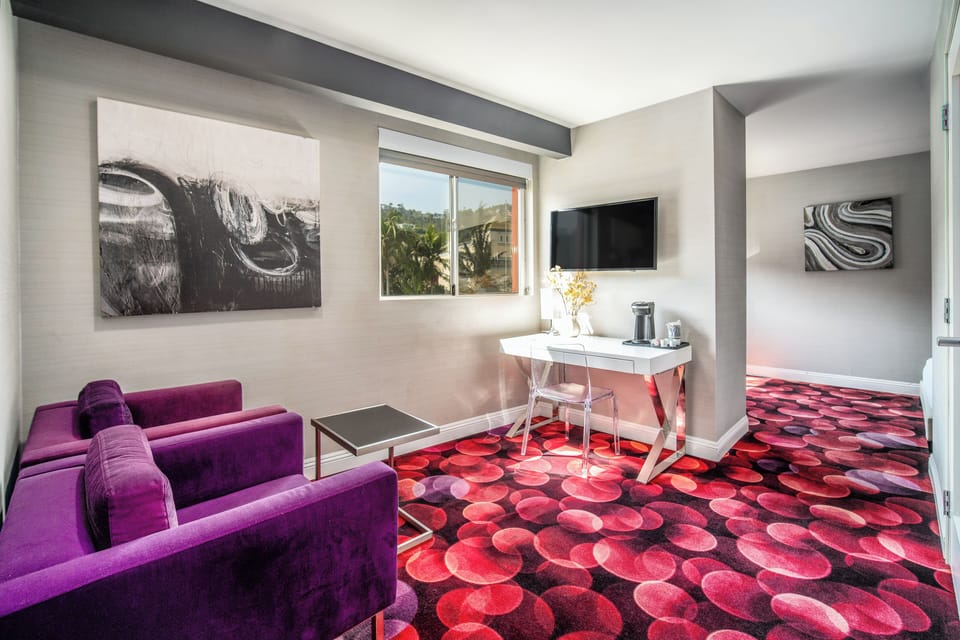 Suite, 2 Bedrooms | Living area | 42-inch flat-screen TV with cable channels, TV