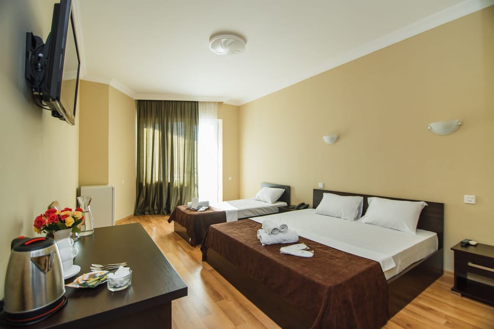 Triple Room | Minibar, desk, soundproofing, iron/ironing board (on request)