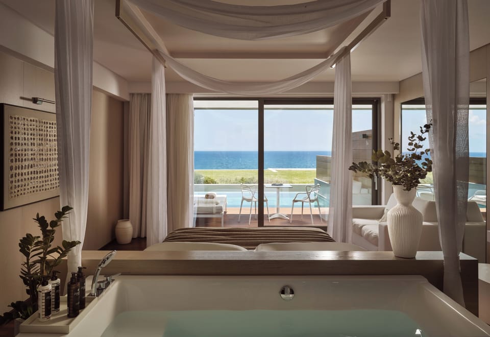 Separate tub and shower, designer toiletries, hair dryer, bathrobes