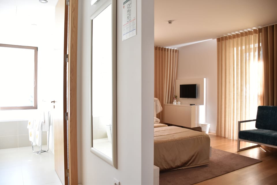 Family Room | Minibar, in-room safe, individually decorated, individually furnished