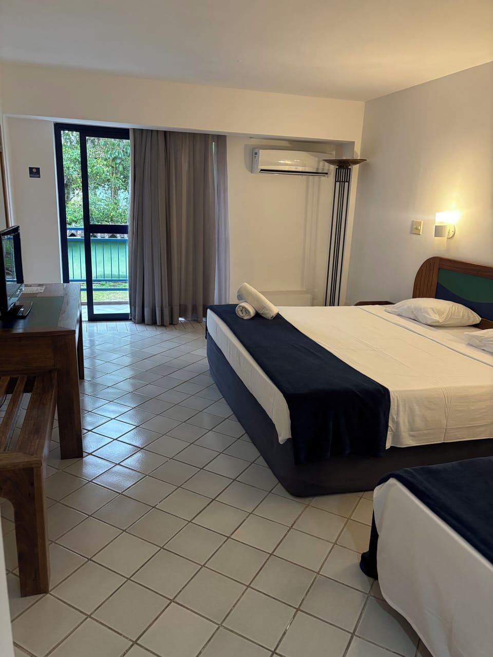 Superior Triple Room | Minibar, desk, blackout drapes, iron/ironing board