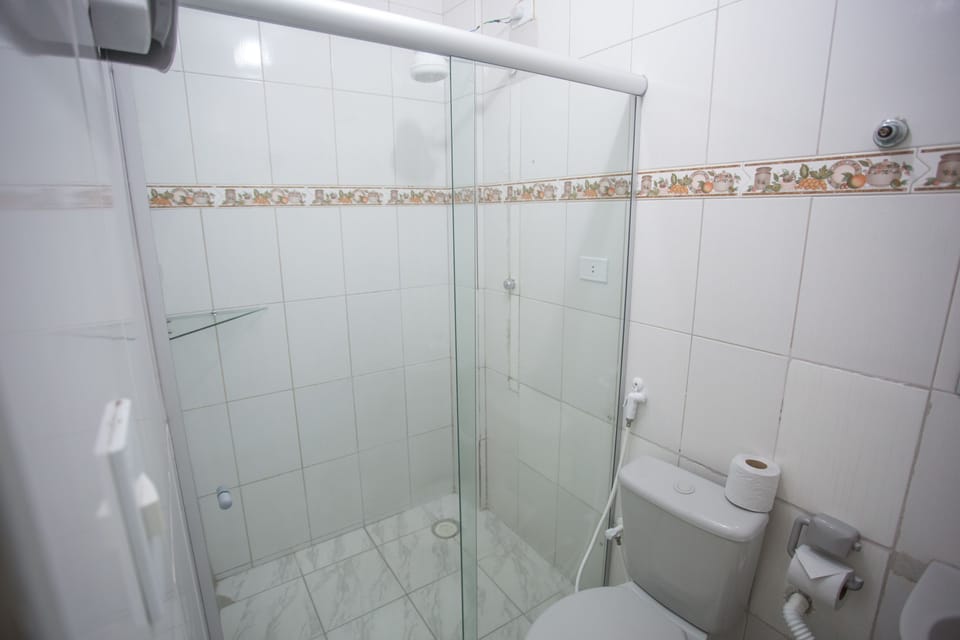 Basic Double Room, 1 Double Bed | Bathroom | Shower, towels