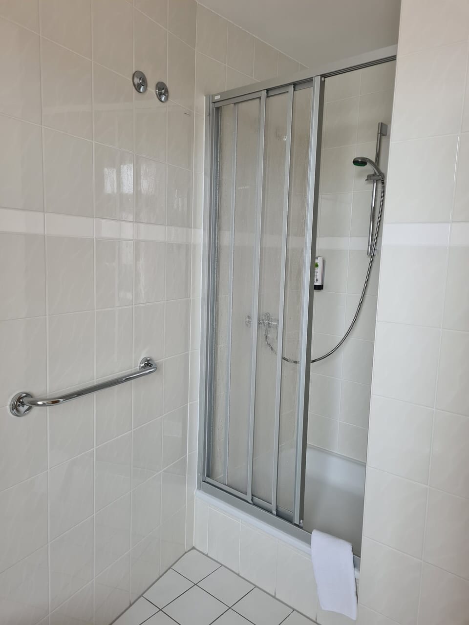 Shower, free toiletries, hair dryer, towels