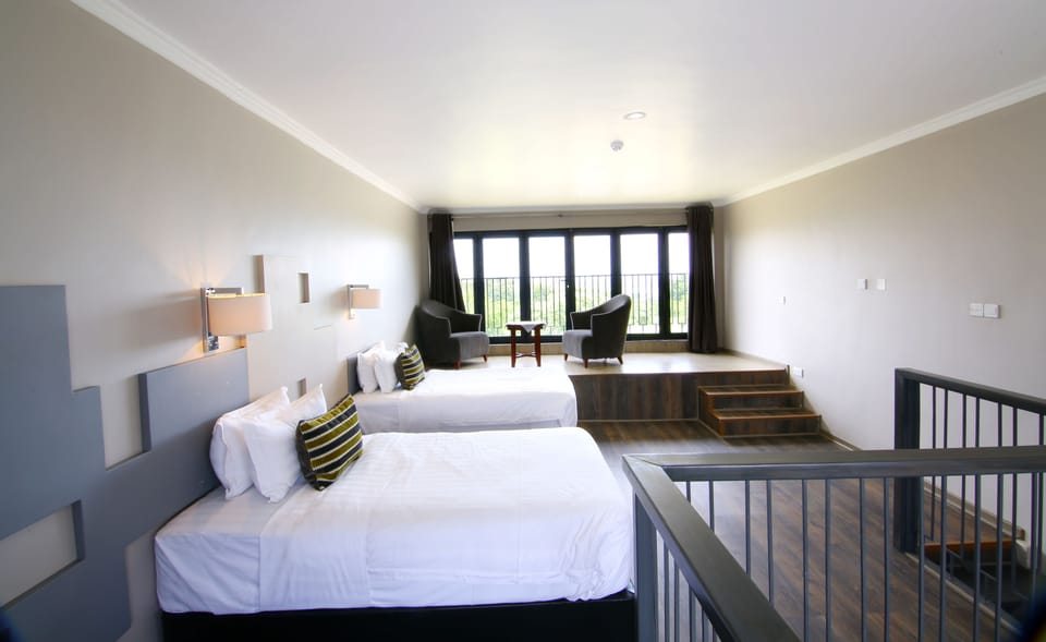 Family Room | In-room safe, desk, blackout drapes, iron/ironing board (on request)