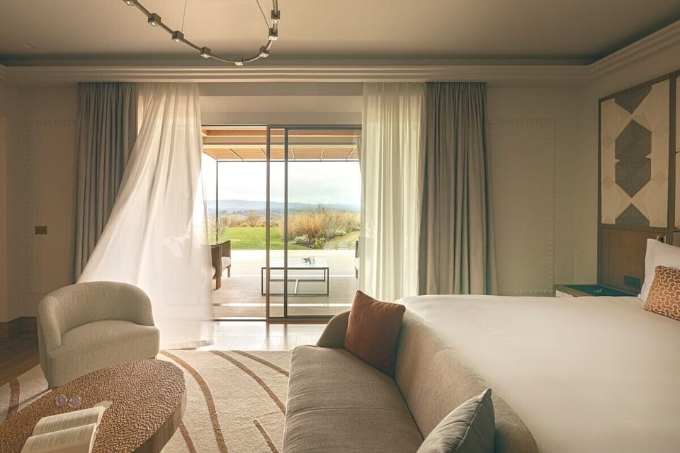 Hypo-allergenic bedding, down comforters, minibar, in-room safe