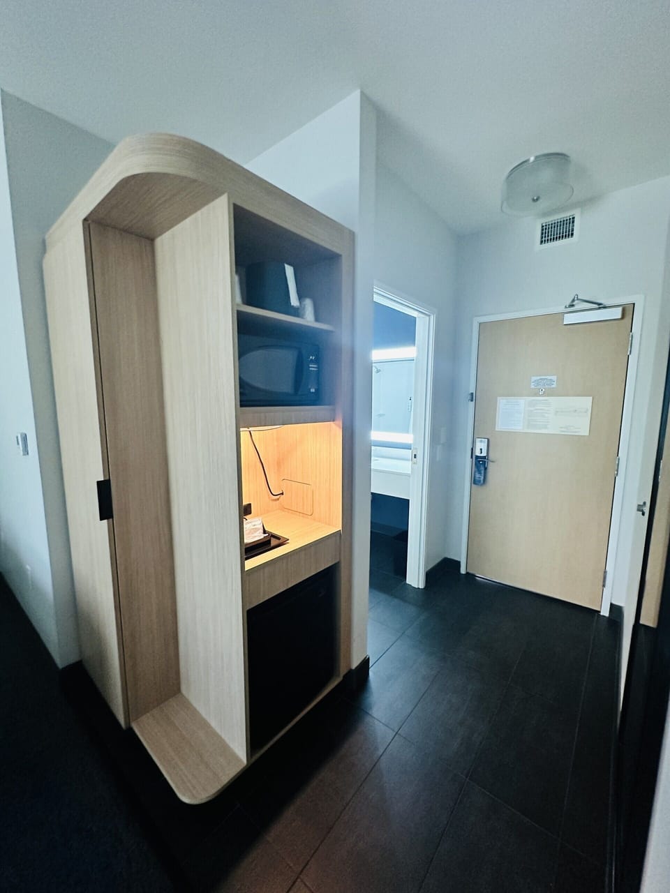Desk, laptop workspace, blackout drapes, iron/ironing board