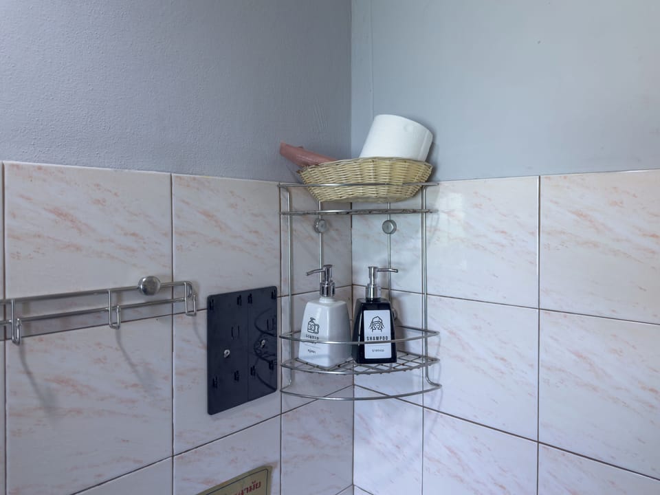 Standard Double Room | Bathroom | Shower, free toiletries, hair dryer, slippers