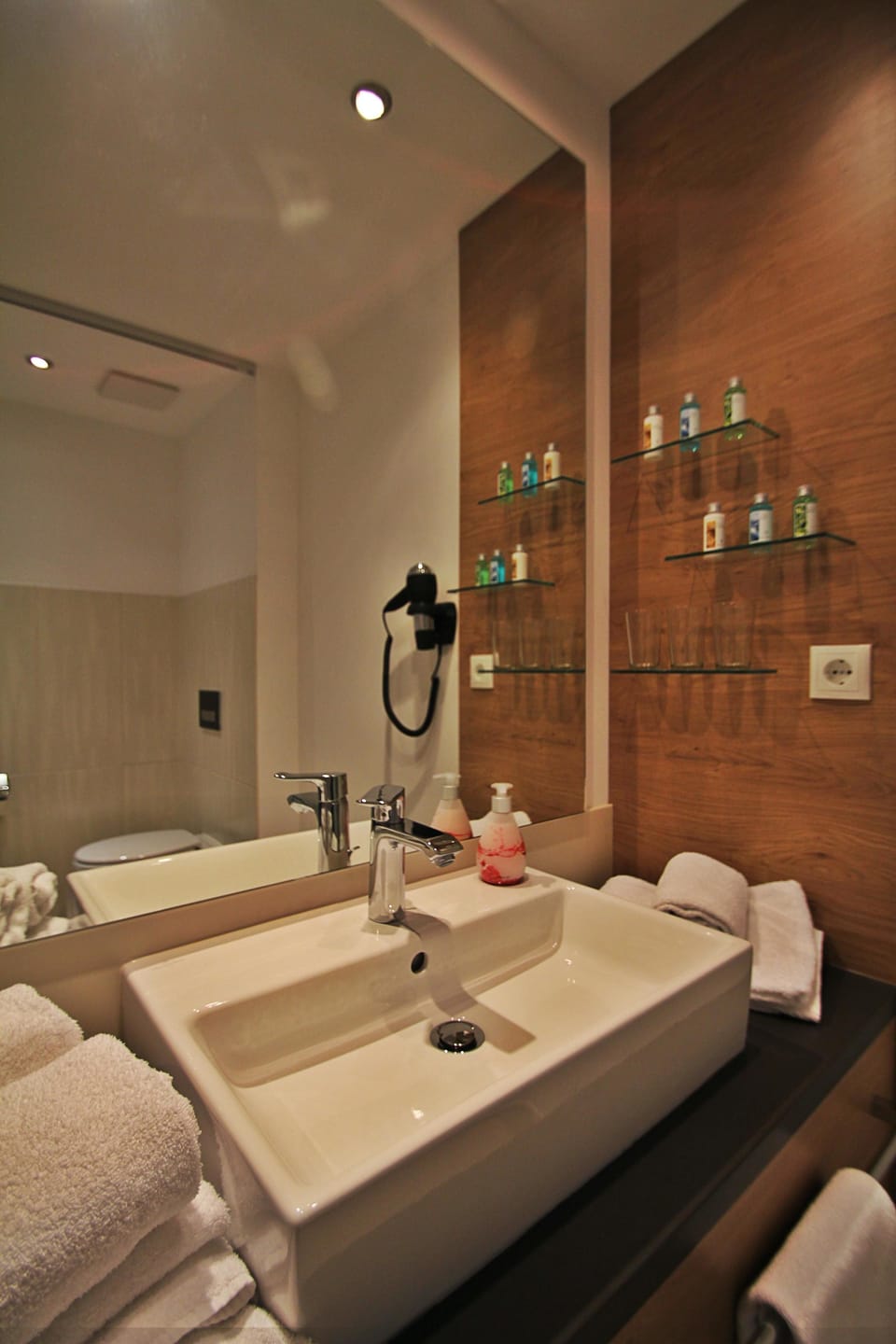 Shower, free toiletries, hair dryer, slippers