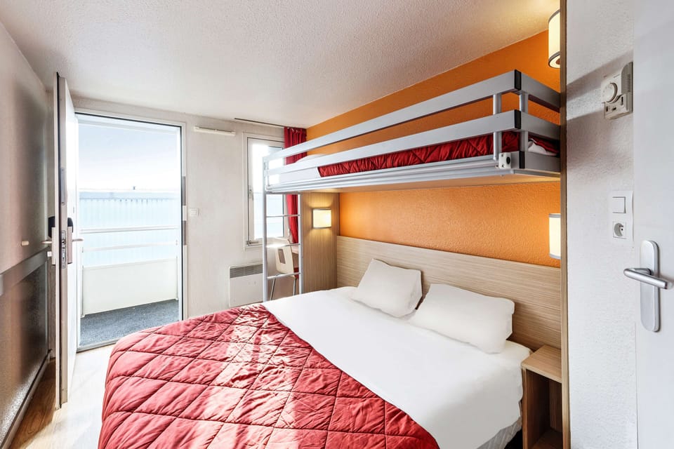 Desk, blackout drapes, iron/ironing board, free WiFi