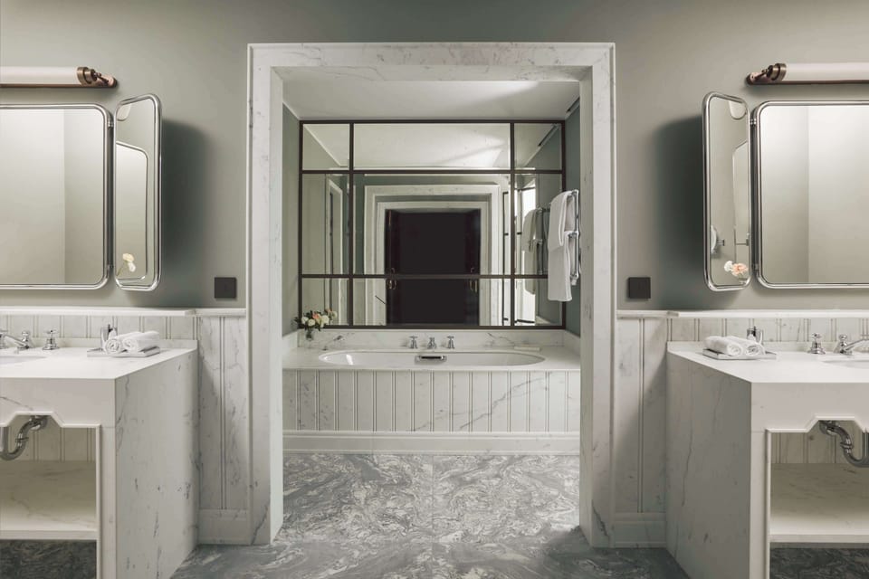 Combined shower/tub, rainfall showerhead, hair dryer, bathrobes