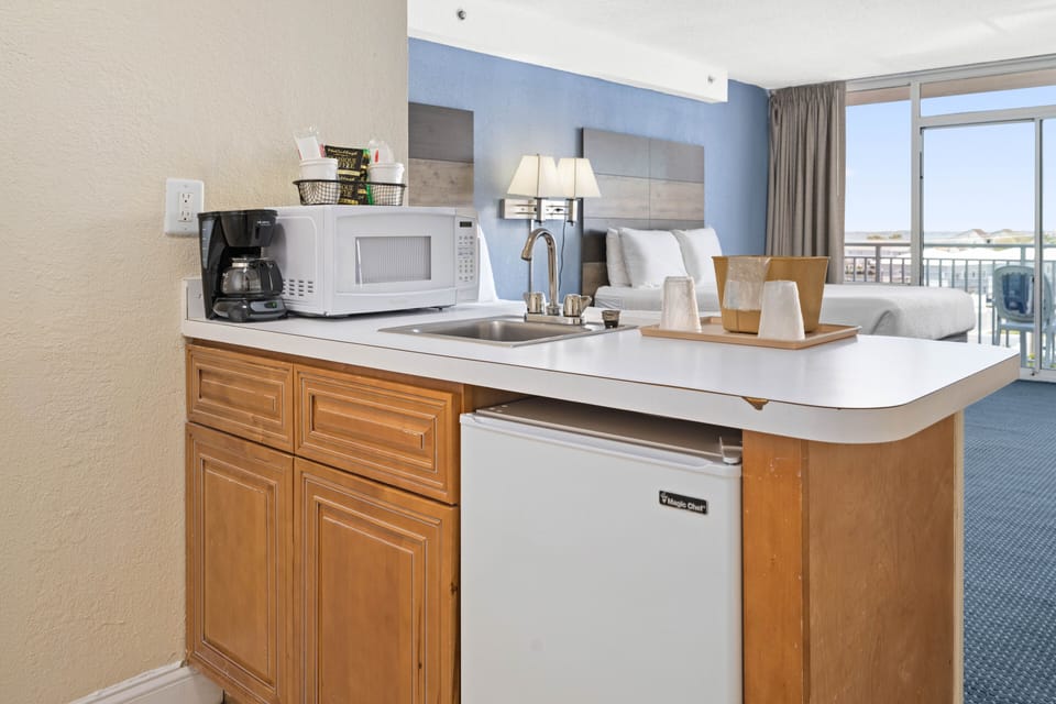 Standard Room, 2 Queen Beds (Western View) | Private kitchenette | Fridge, microwave, coffee/tea maker
