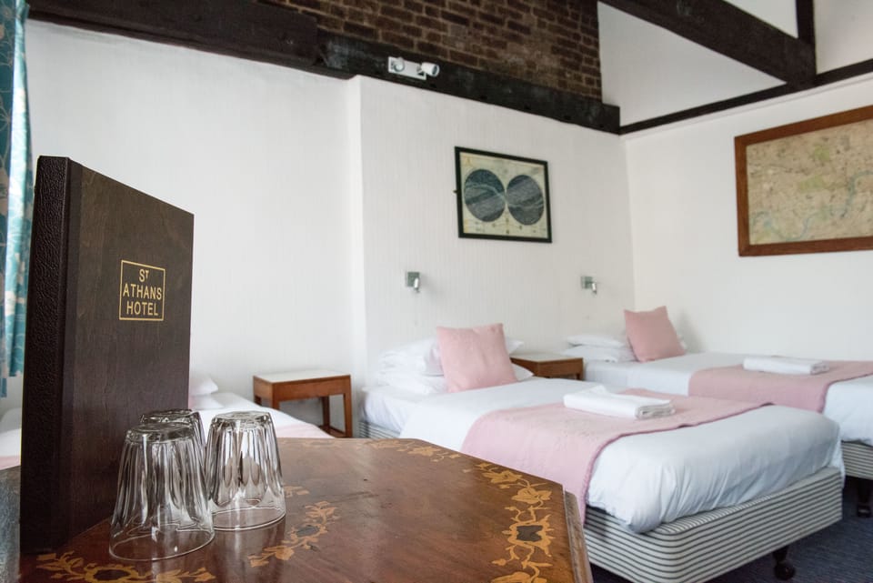 Triple Room, Shared Bathroom | Individually decorated, individually furnished, blackout drapes