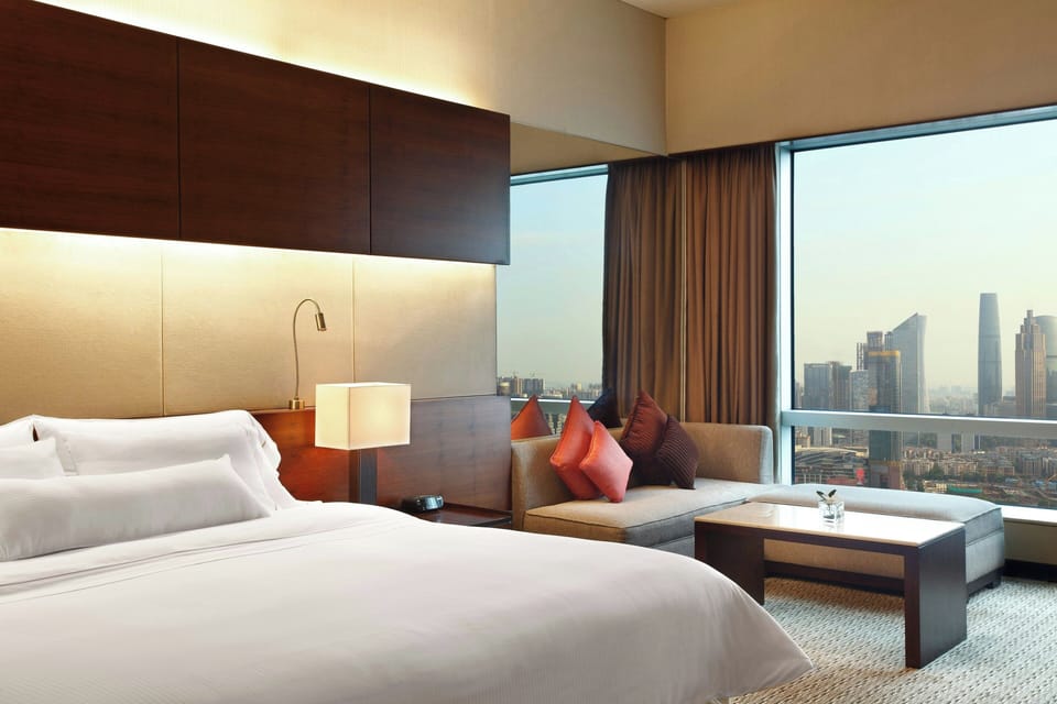 Room, 1 King Bed, City View | 1 bedroom, premium bedding, down comforters, minibar