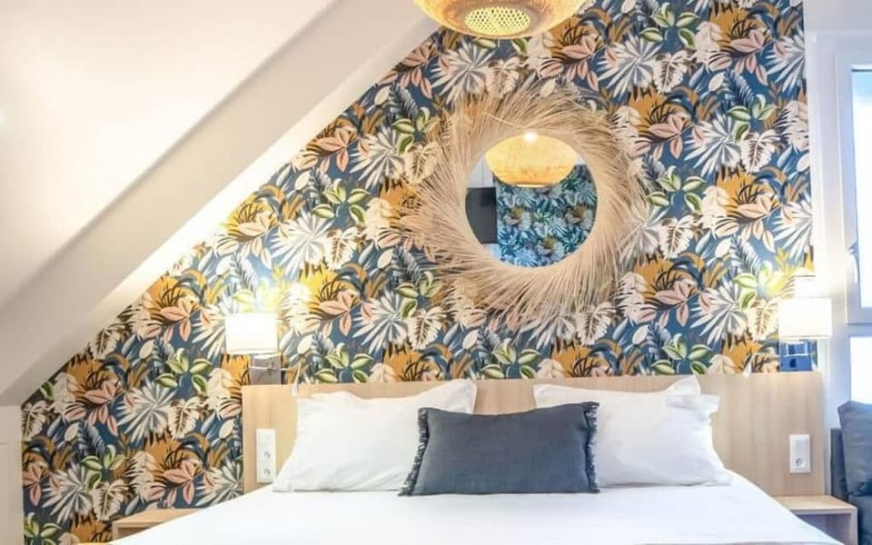 Suite | In-room safe, individually decorated, desk, blackout drapes