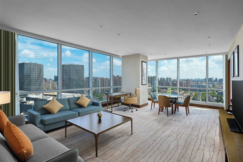 Suite, 1 Bedroom, City View, Corner | Living room | Flat-screen TV, DVD player