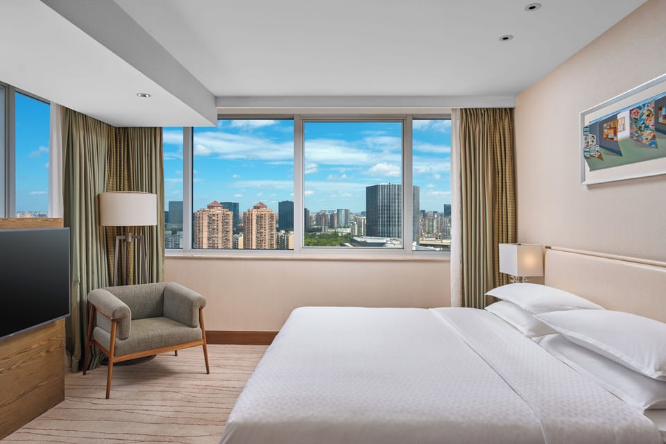 Suite, 1 Bedroom, City View | Premium bedding, minibar, in-room safe, desk