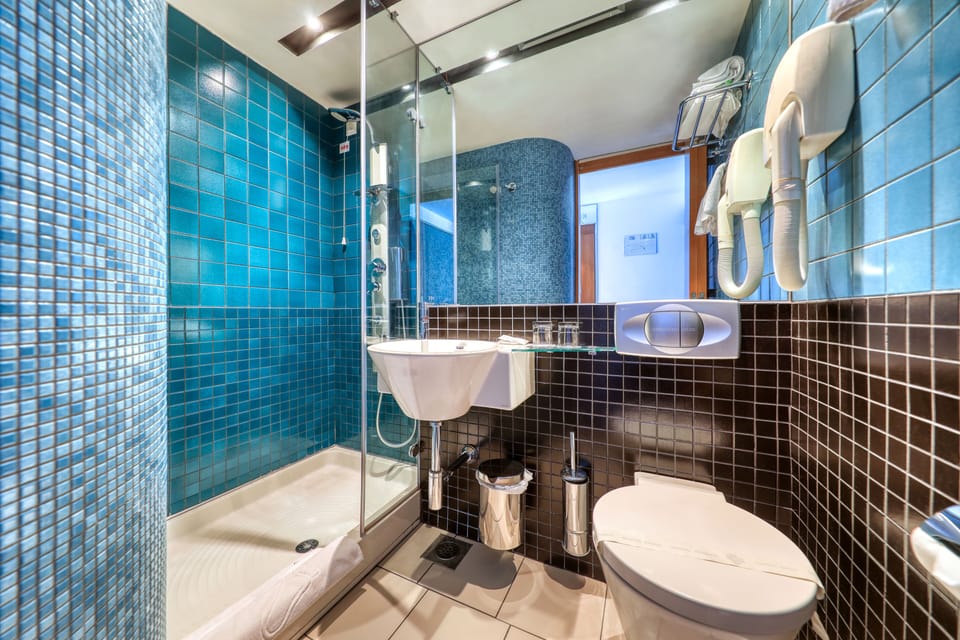 Superior Double Room, Balcony (Sea View) | Bathroom | Shower, hair dryer, towels, soap