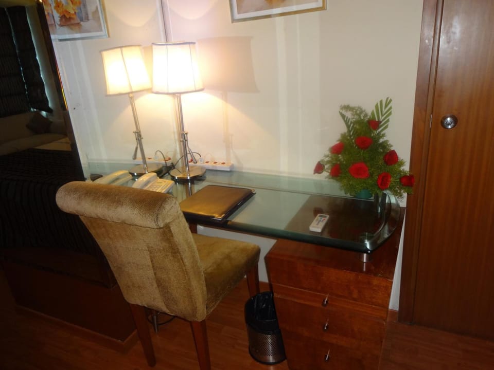 21-inch flat-screen TV with cable channels, TV