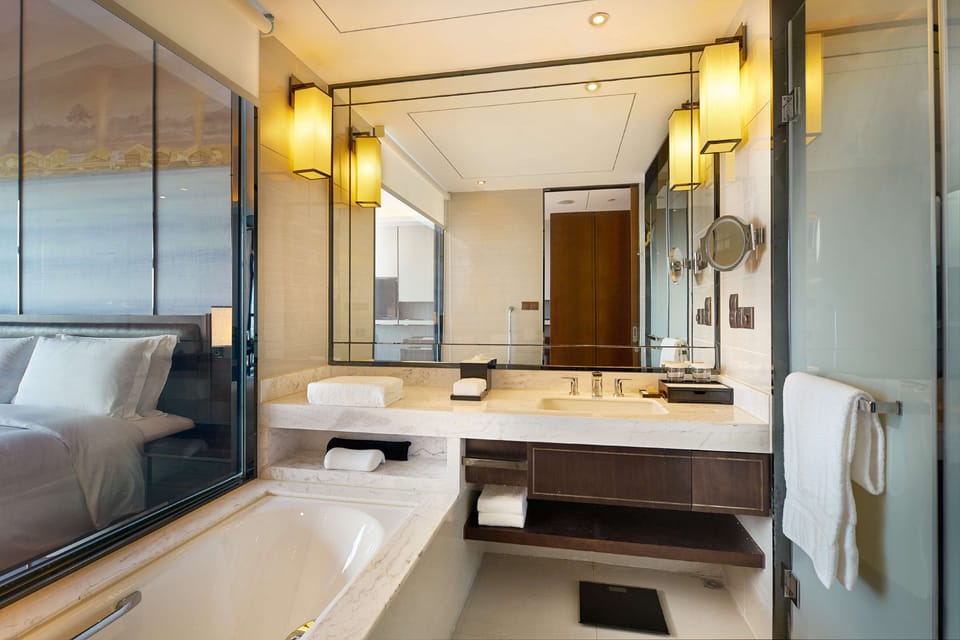 Separate tub and shower, free toiletries, hair dryer, bathrobes