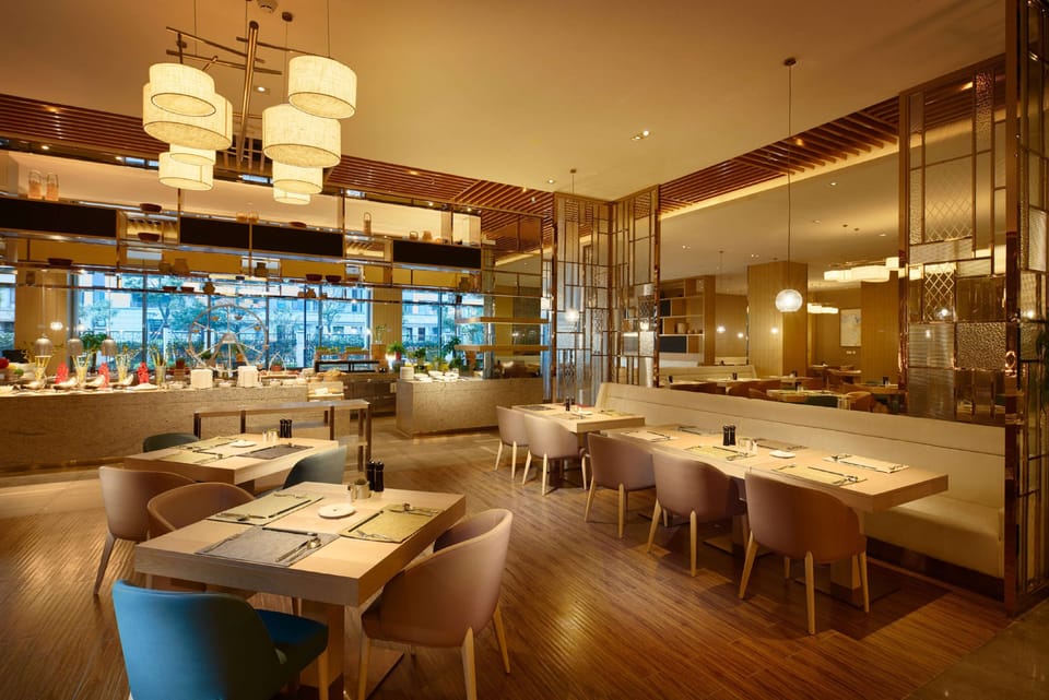 2 restaurants, breakfast, lunch, dinner served; Chinese cuisine