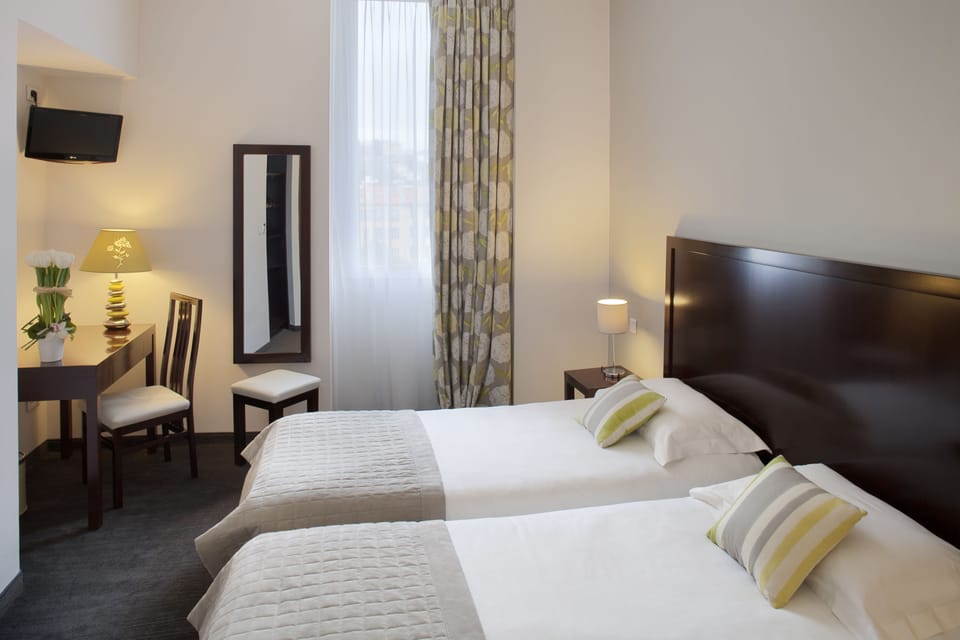 Twin Room | Premium bedding, desk, blackout drapes, soundproofing