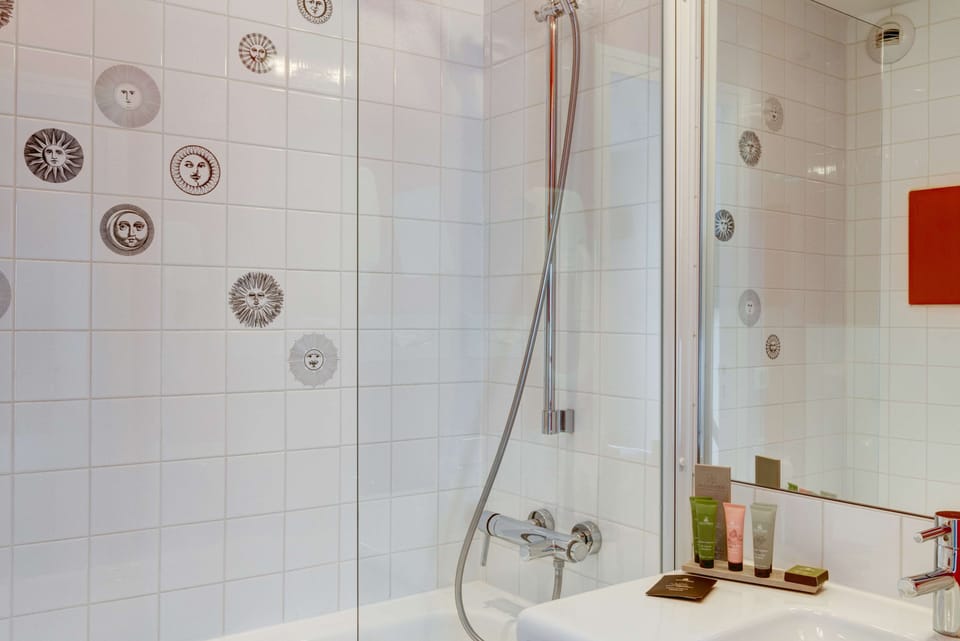 Single Room - Complimentary soft minibar,Courtesy tray,Chromecast, Digital press | Bathroom | Shower, free toiletries, hair dryer, towels