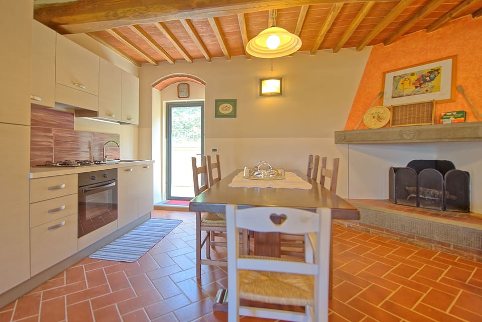 Villa | Private kitchen | Full-size fridge, oven, toaster, cookware/dishes/utensils