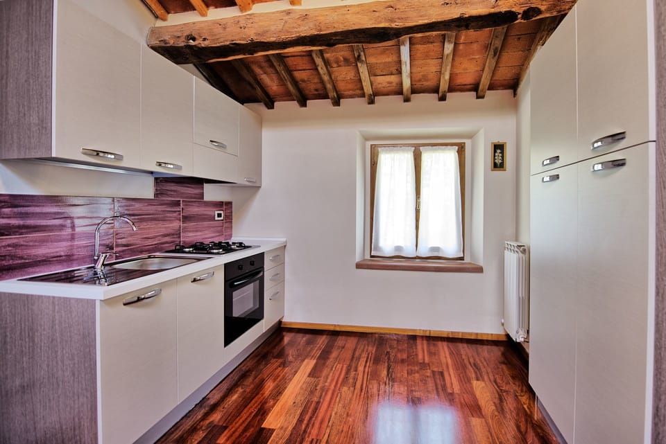 Apartment, 5 Bedrooms | Private kitchenette | Full-size fridge, oven, toaster, cookware/dishes/utensils