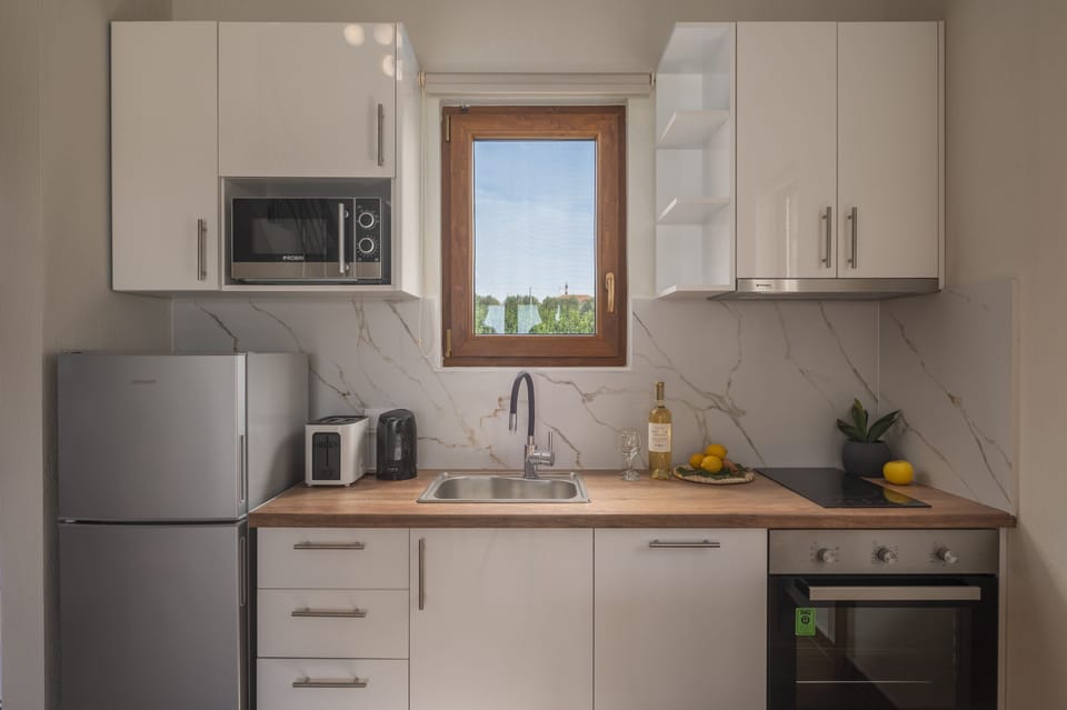 Family Villa, 2 Bedrooms, Private Pool, Pool View | Private kitchen | Espresso maker, coffee/tea maker, full-size fridge, microwave