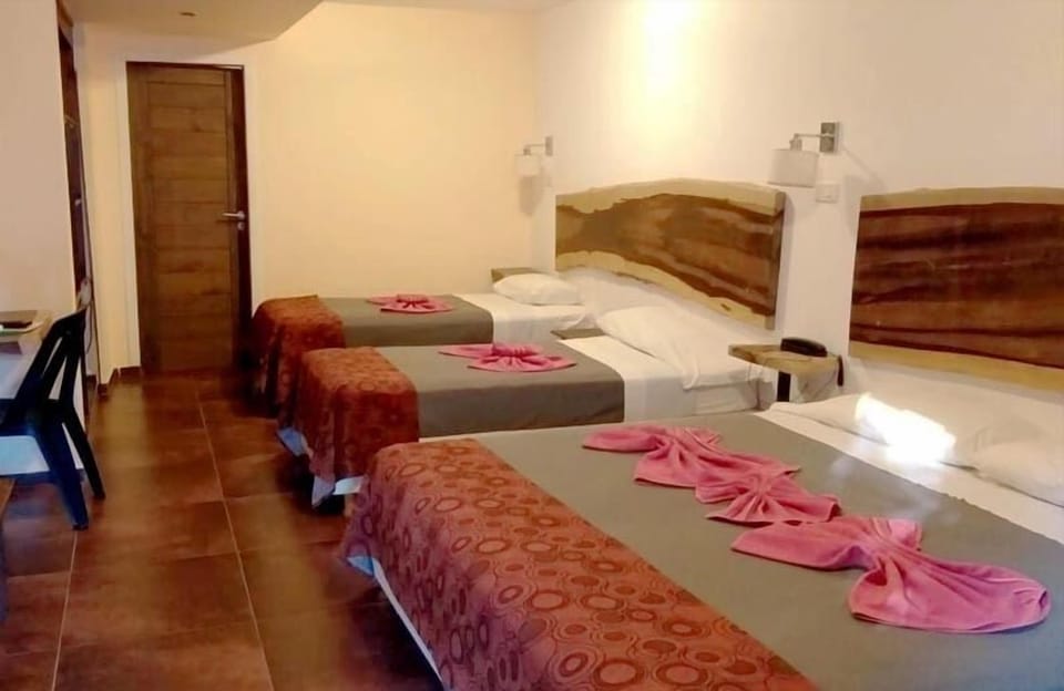 Quadruple Room | Minibar, in-room safe, desk, free WiFi