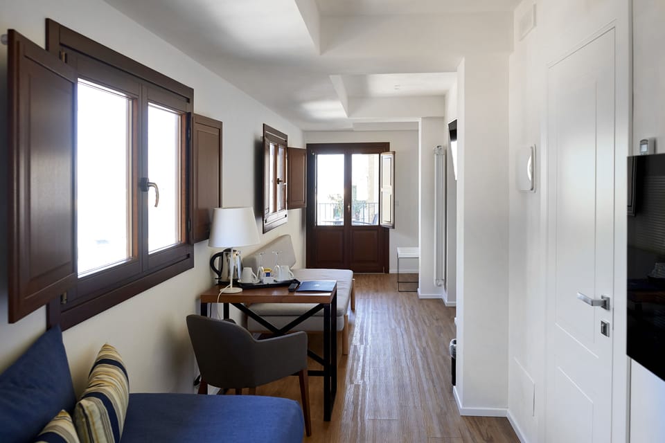 Junior Suite, Sea View | Premium bedding, down comforters, minibar, in-room safe