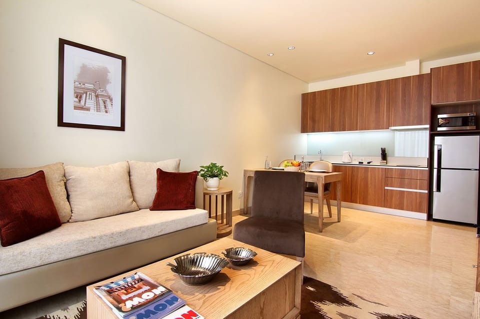 Executive Room, 2 Bedrooms | Living area | 40-inch LED TV with cable channels, TV