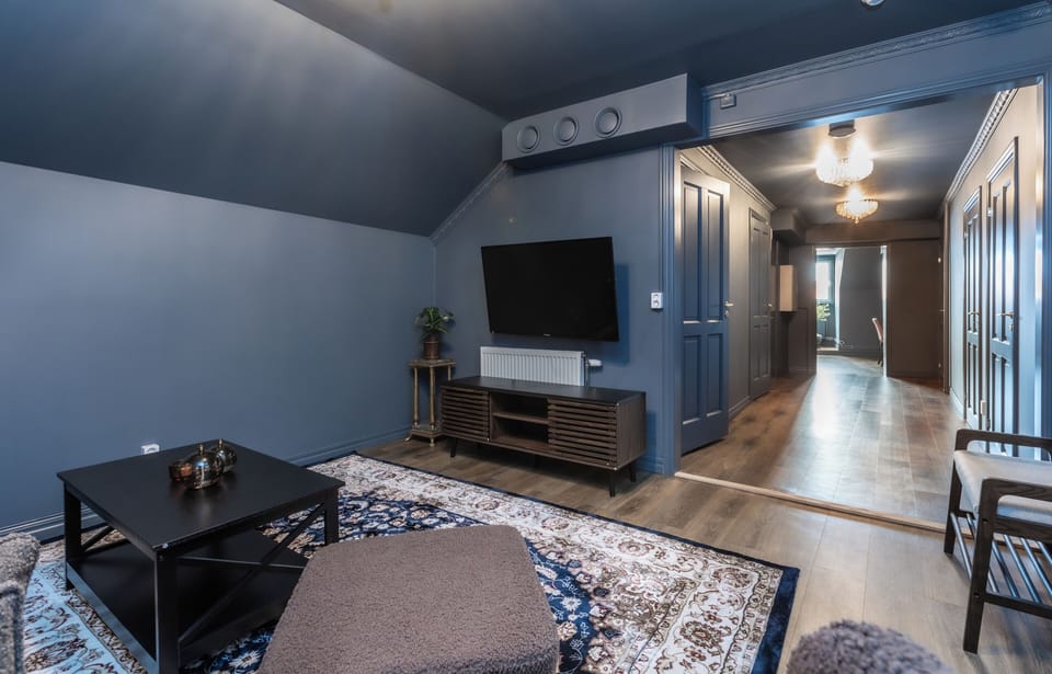 City Condo | Individually decorated, desk, laptop workspace, iron/ironing board