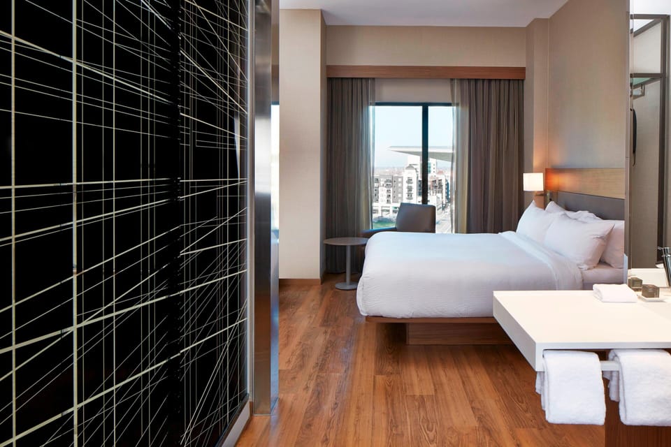 Room, 1 King Bed | Premium bedding, pillowtop beds, in-room safe, desk