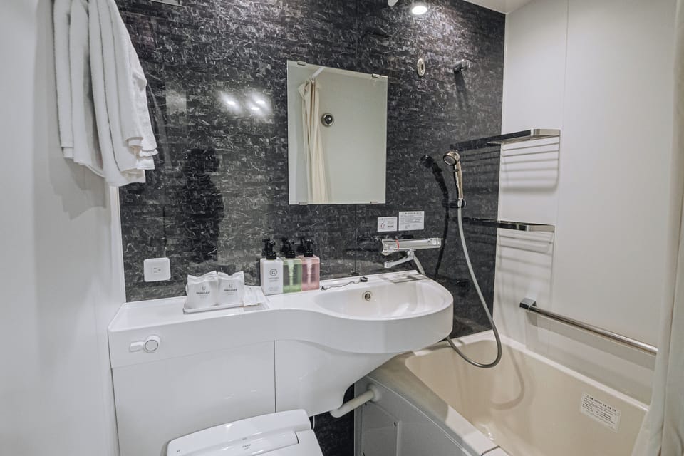 Premium Double Room, Non Smoking | Bathroom | Combined shower/tub, deep soaking tub, free toiletries, hair dryer