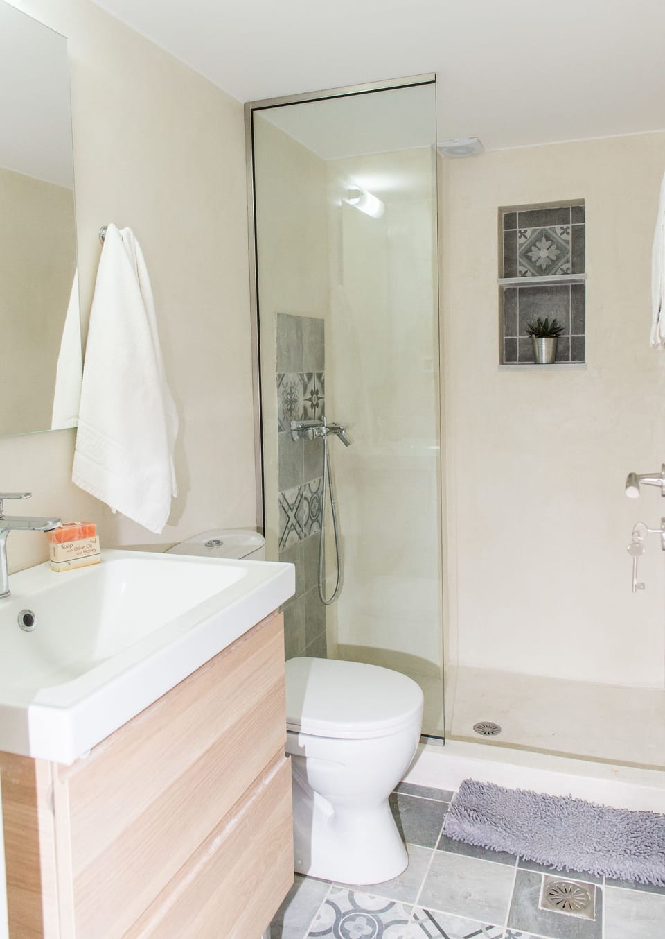 Above the Lake | Bathroom | Shower, designer toiletries, hair dryer, bathrobes