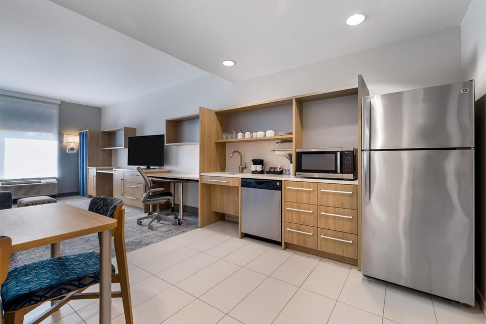 Suite, 1 King Bed, Accessible, Non Smoking (mob/hearing acc w/ roll-in shower) | Private kitchen | Full-size fridge, microwave, dishwasher, coffee/tea maker