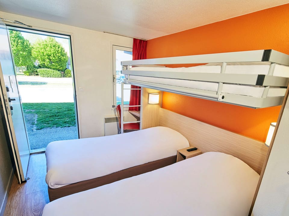 Standard Room, 3 Twin Beds | Pillowtop beds, desk, laptop workspace, blackout drapes