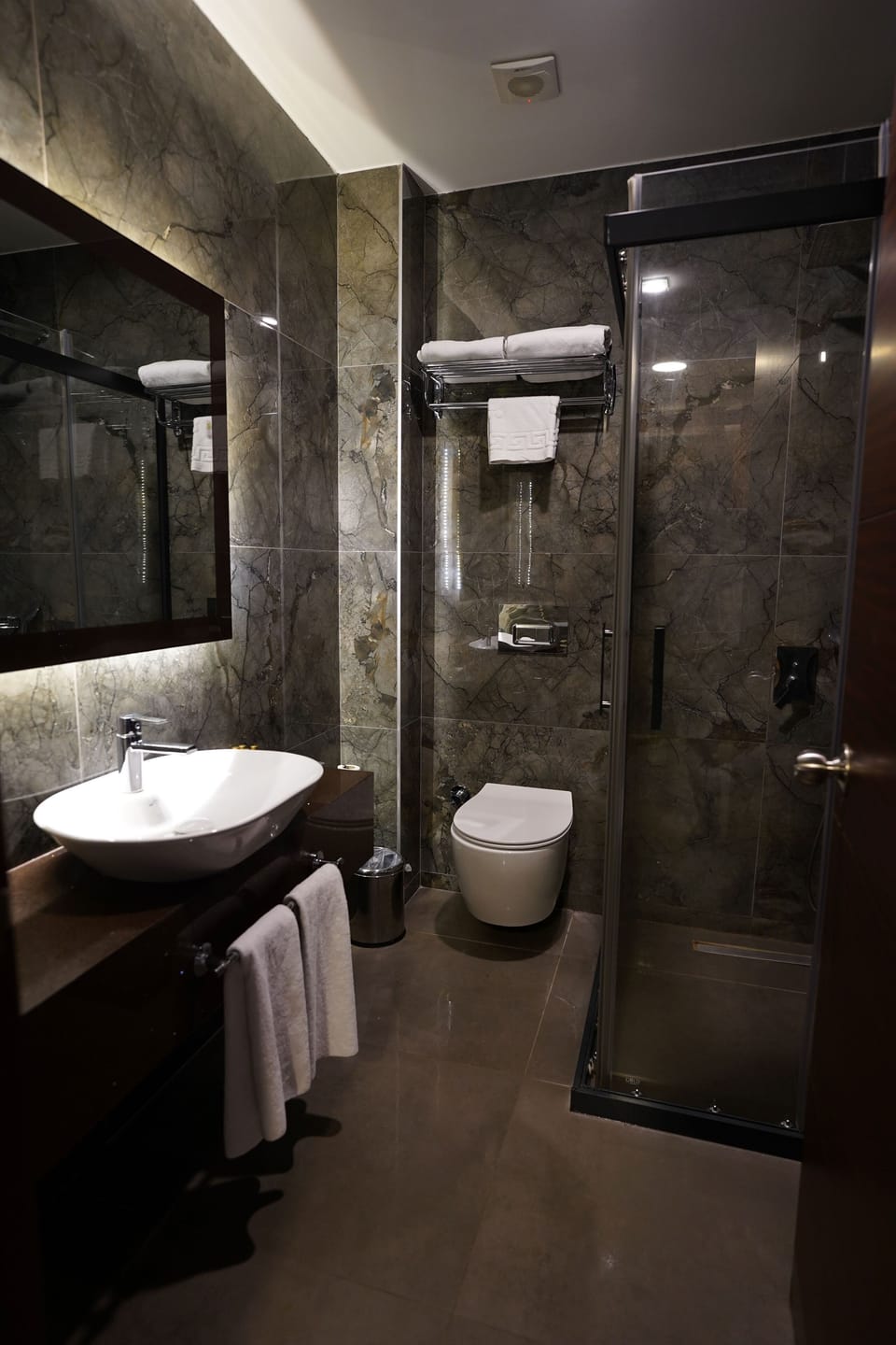 Shower, free toiletries, hair dryer, slippers
