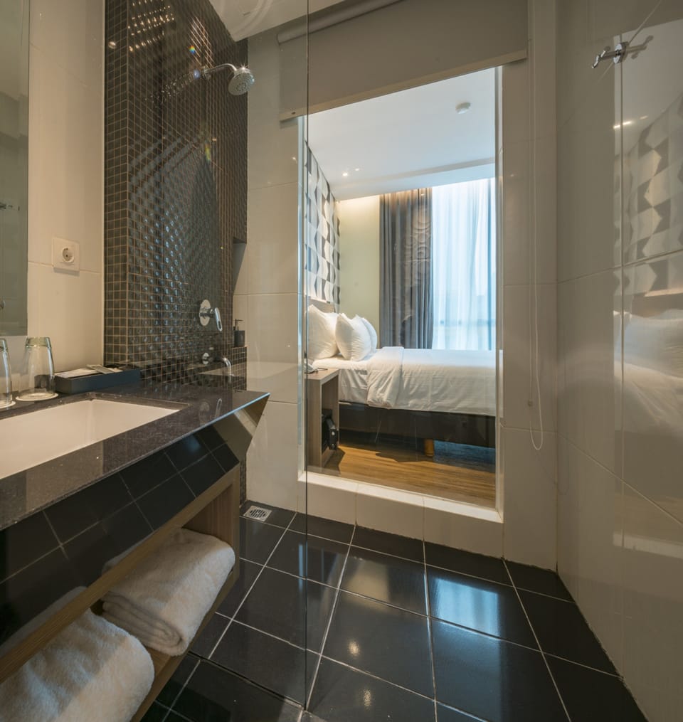 Shower, free toiletries, slippers, towels
