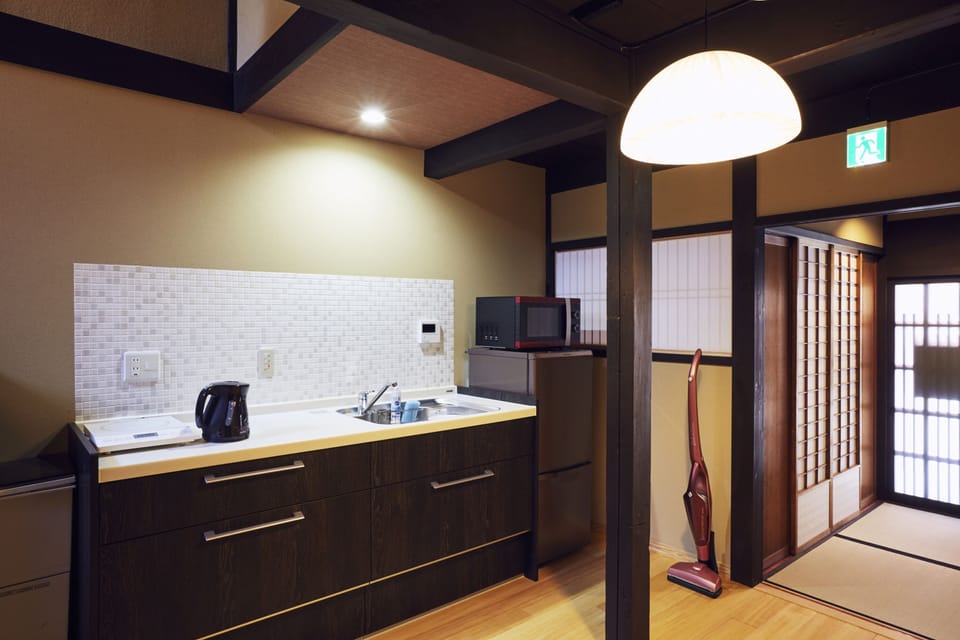 Japanese Style Townhouse (Beds + Futons) | Private kitchen | Fridge, microwave, coffee/tea maker, electric kettle